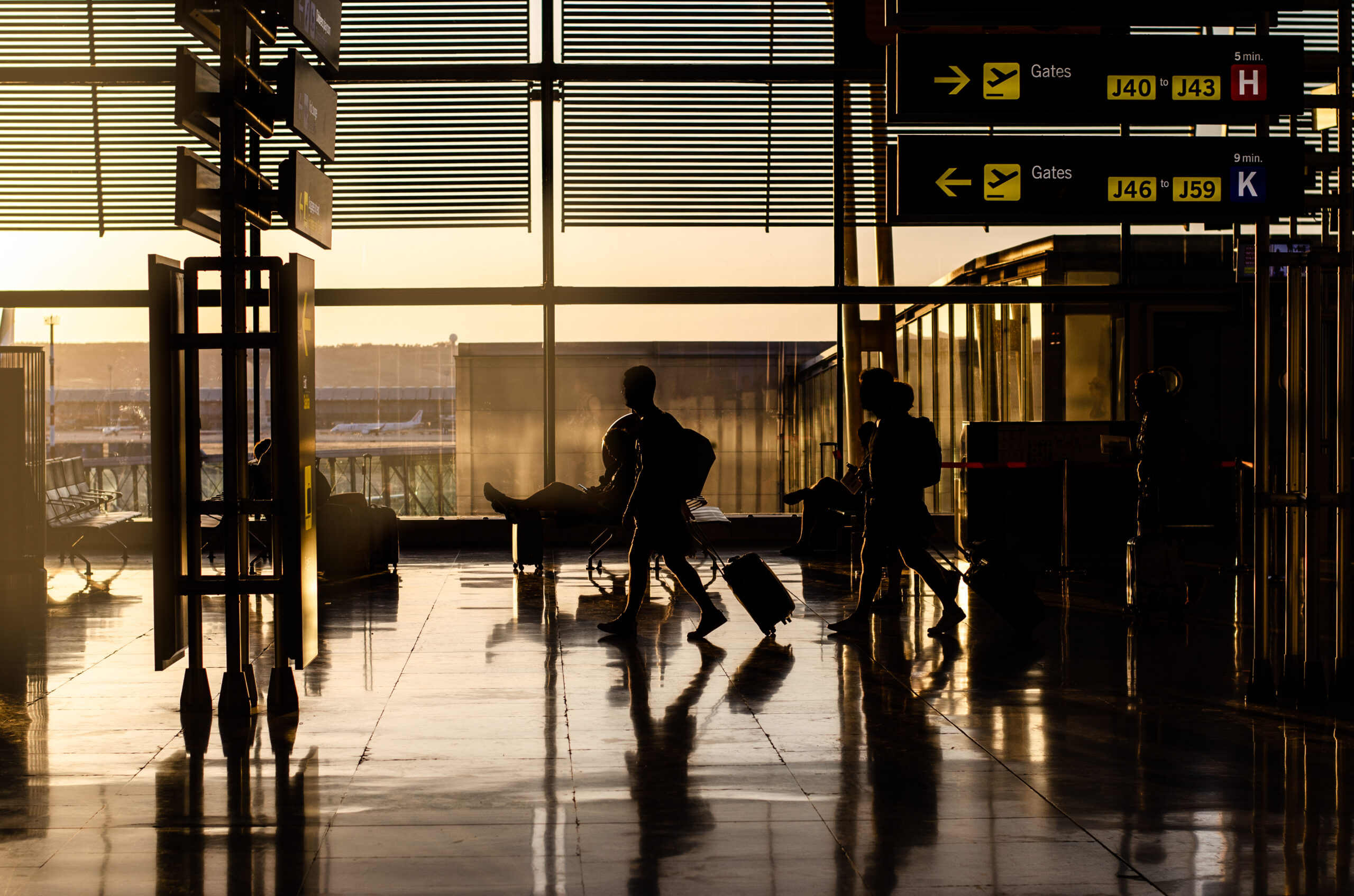 people walking inside airport terminal 1 scaled